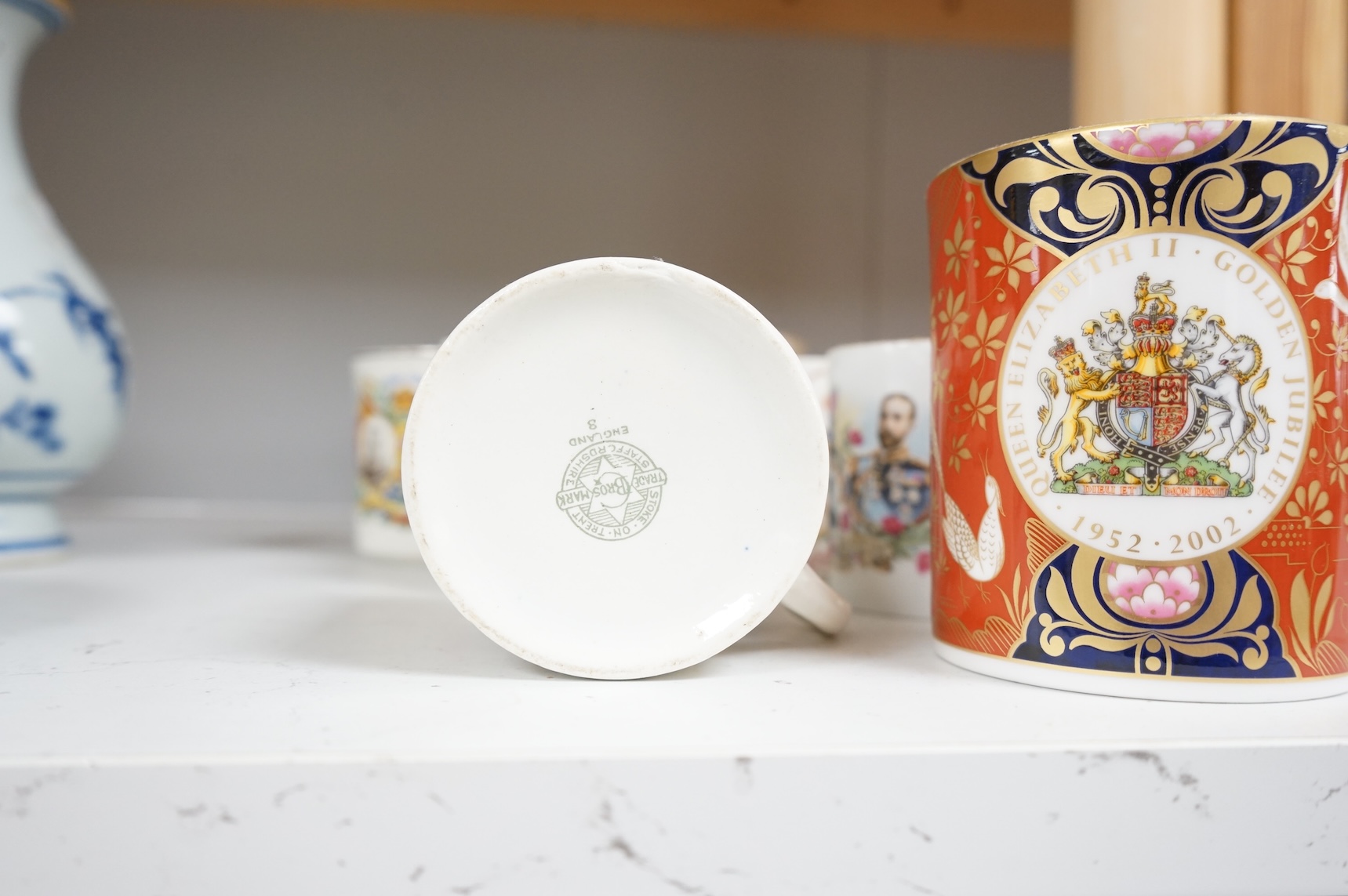 A lithophane commemorative mug and ten others to include George VI and Elizabeth coronation 1937, largest 9.5cm high